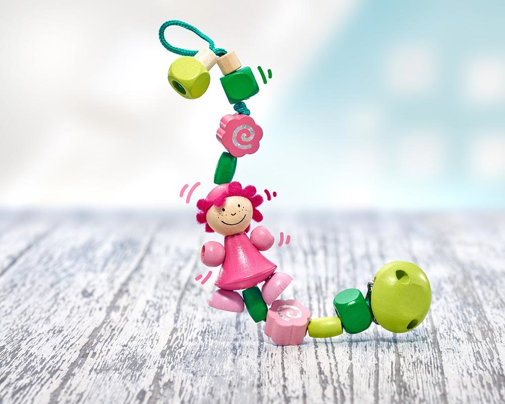 Attache jouet rose
